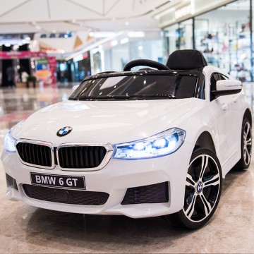 Акумулаторна кола BMW 6 GT с отварящи се врати 12V меки гуми Бяла
