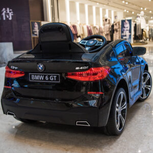 Акумулаторна кола BMW 6 GT с отварящи се врати 12V меки гуми - Черна