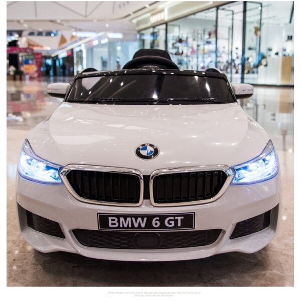 Акумулаторна кола BMW 6 GT с отварящи се врати 12V меки гуми Бяла