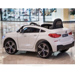 Акумулаторна кола BMW 6 GT с отварящи се врати 12V меки гуми Бяла