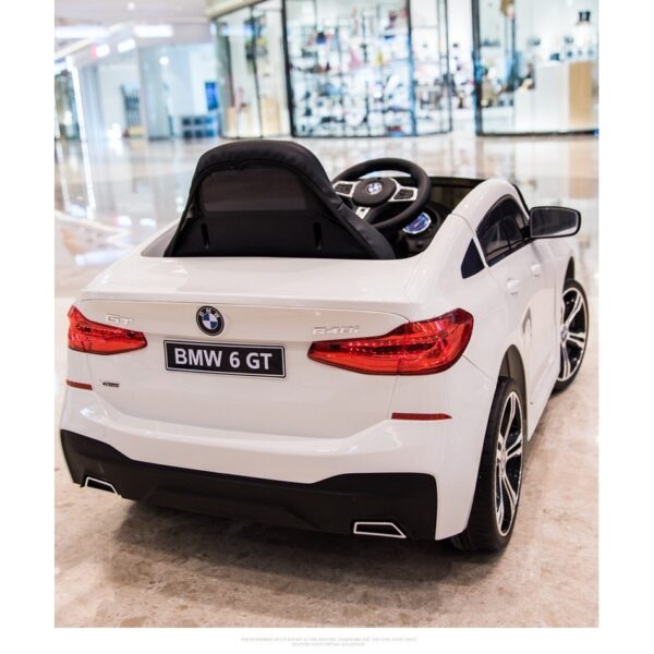 Акумулаторна кола BMW 6 GT с отварящи се врати 12V меки гуми Бяла